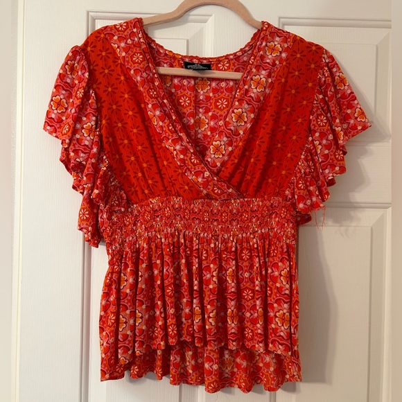 candy orange and pink floral screen printed blouse with tassels main image 0